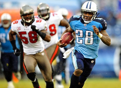 He's back!  Chris Johnson shows his breakaway speed in running for a season-high 190 yards. (Getty Images)