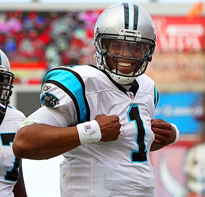 Cam Newton smiles after scoring one of his three rushing touchdowns against Tampa Bay. (US Presswire)
