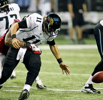 Blaine Gabbert fumbles twice and ends the game with 141 yards passing in a dismal performance against the Falcons.  (US Presswire)