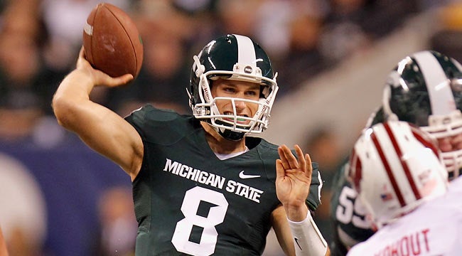 MSU's Kirk Cousins might not be viewed as a first-rounder, but he is on many scouts' radars. (Getty Images)