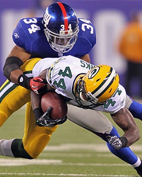 In the first meeting vs. the Packers, the Giants lined up safety Deon Grant as a linebacker. (Getty Images)