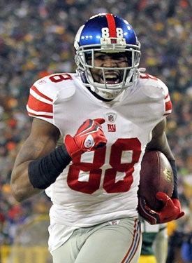 Hakeem Nicks has two TD catches in each of the Giants' playoff victories. (Getty Images)