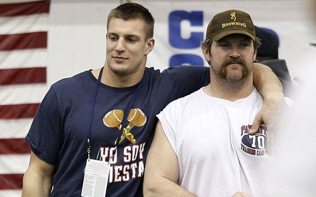 Rob Gronkowski can lean on Logan Mankins at practice, but Sunday he'll be on his own. (AP)