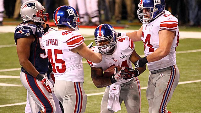 The Giants weren't quite sure how much to celebrate Ahmad Bradshaw's TD with 57 seconds left. (US Presswire)