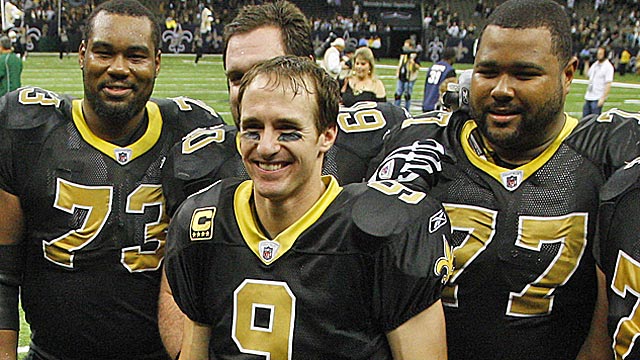 Jahri Evans (73) got his big money; now Brees and Carl Nicks (77) await their deals. (US Presswire)
