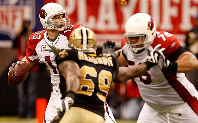 Kurt Warner quit playing after taking several big hits vs. the Saints in the 2009 playoffs. (Getty Images)