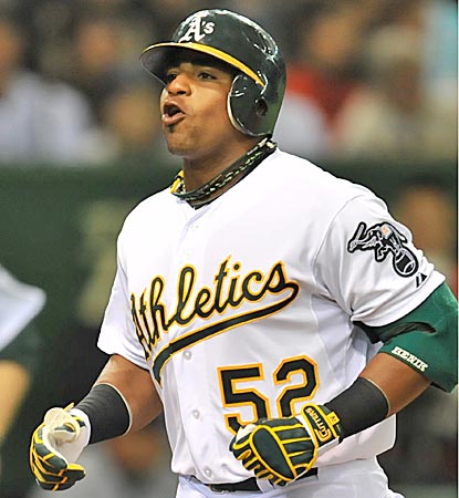 Rookie Yoenis Cespedes celebrates his  two-run shot in the seventh and finishes the day 1 for 3. (US Presswire)