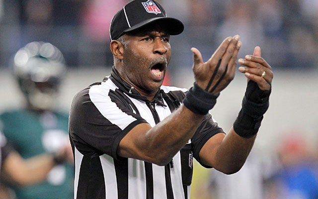 Expanding the definition of defenseless player puts more of a strain on game officials. (Getty Images)
