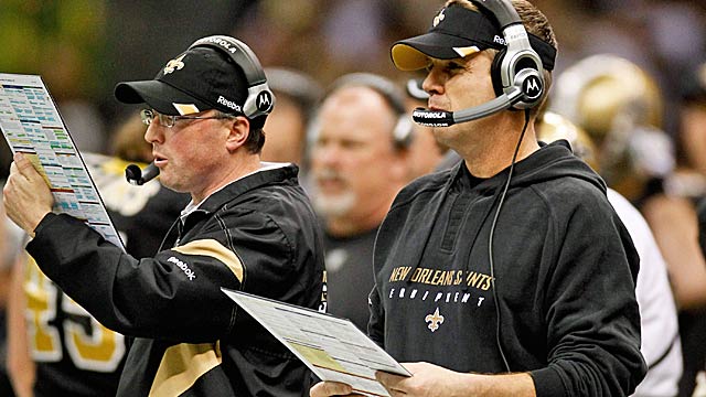 Sean Payton (right) passed over esteemed OC Pete Carmichael (left) for the interim job. (US Presswire)