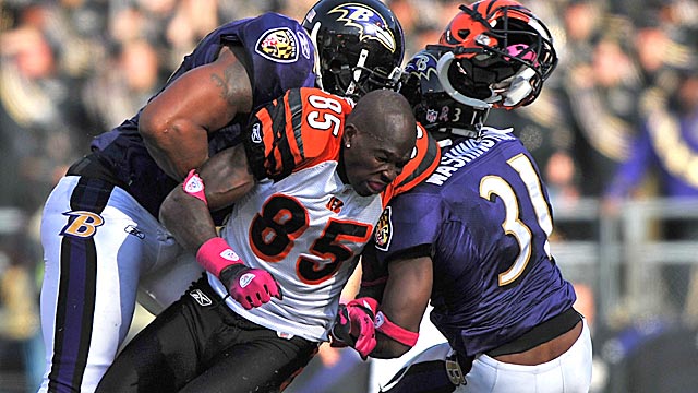 Removing facemasks would likely cut down on helmet-to-helmet hits. (Getty Images)
