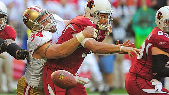 Justin Smith is a steal at $6.375M, while Kevin Kolb hasn't played up to his contract in Arizona. (US Presswire)