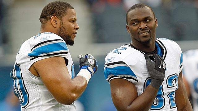 Ndamukong Suh (left) has often made the wrong kinds of headlines; Cliff Avril (right) has not. (Getty Images)