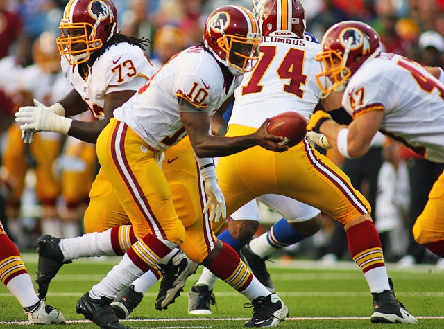 The Redskins keep it simple on offense for Robert Griffin III in his preseason debut and he plays well. (AP)