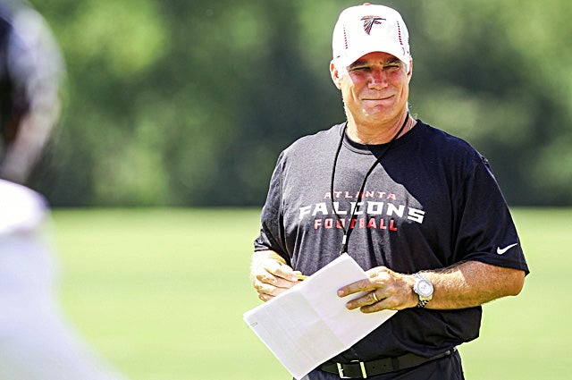 Falcons owner Arthur Blank says coach Mike Smith (above) is not in trouble but wants results. (US Presswire)
