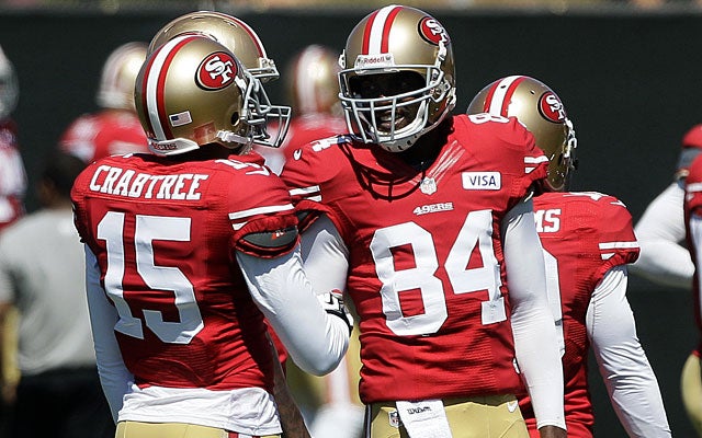 Worried about Michael Crabtree learning from Randy Moss? So far, so good, say the Niners. (AP)