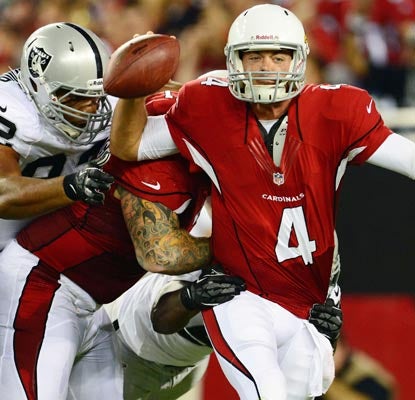 Kevin Kolb has a rough night getting sacked three times and earning a rough review from the opposition.  (US Presswire)