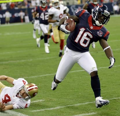 Trindon Holliday scores an 87-yard TD on a punt return, the second week in a row he has found the end zone on special teams.  (AP)