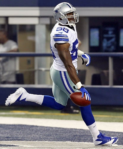 Orie Lemon capitalizes on an interception by returning it 26 yards for a touchdown. (AP)