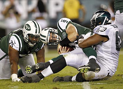 After the Jets finally hit paydirt, the rest of the game goes something like this. Here, Monte Taylor sacks backup Matt Simms.  (Getty Images)