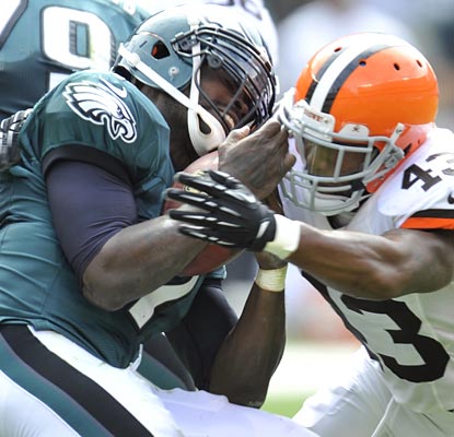 Michael Vick endures a tough opener (four interceptions) in Cleveland, but still leads the Eagles to victory.  (US Presswire)