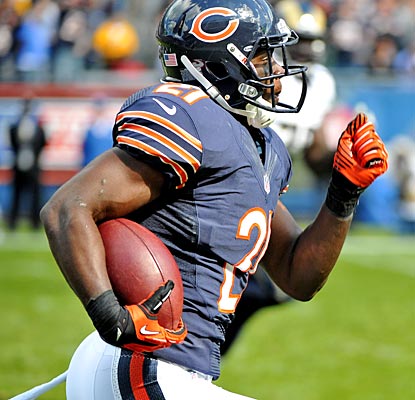 Major Wright is off and running with the game-sealing touchdown, returning an interception 45 yards.  (US Presswire)