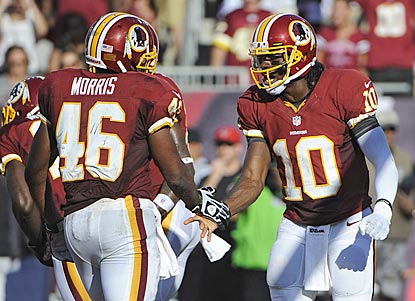 Rookies Alfred Morris (113 rushing yards) and Robert Griffin III (323 passing yards) help Washington squeak past Tampa Bay.  (AP)