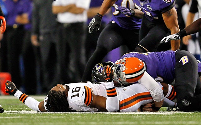 Browns receiver Josh Cribbs lost his helmet on a head-shot hit against the Ravens. (Getty Images)