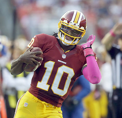  on Rg3 Not Only Runs For 138 Yards And Throws For 182 More  He Also Helps