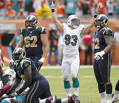 Miami's Jason Trusnik celebrates after watching St. Louis' attempt at a tying field goal fail in the final seconds. (US Presswire)