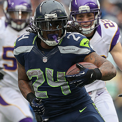 Marshawn Lynch collects 124 rushing yards and scores a TD in the third quarter to give the Seahawks a 10-point lead. (Getty Images)