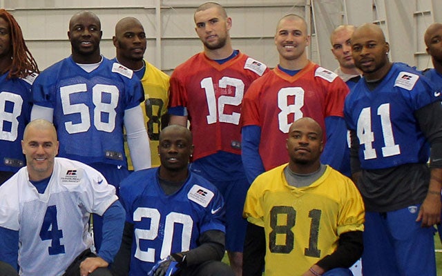Adam Vinatieri (4) and Andrew Luck (12) are among the Colts' players going without hair now. (AP)
