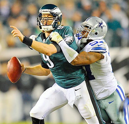 Rookie Nick Foles steps in for the concussed Michael Vick, but struggles against the Cowboys' aggressive defensive unit. (US Presswire)