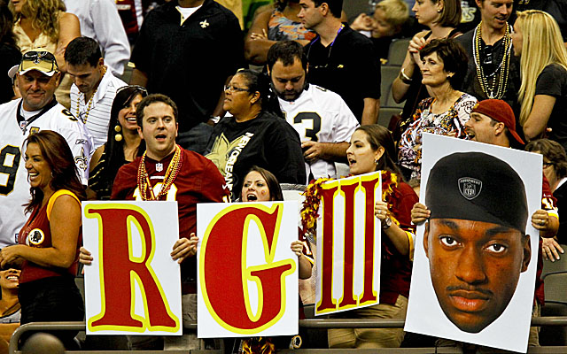 RG3 finds a following even as the Redskins, here at the Superdome, go on the road. (Getty Images)