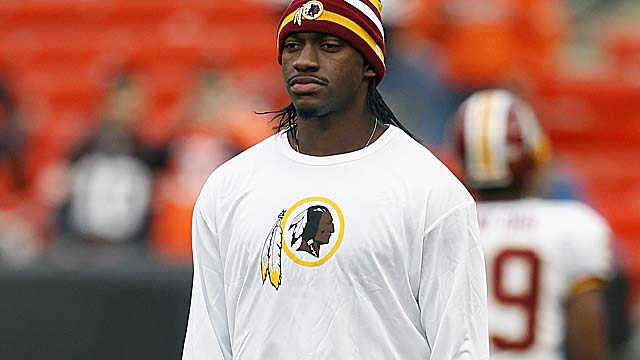 Robert Griffin III wore an Adidas T-shirt and sweat jacket as he addressed reporters on Sunday. (Getty Images)