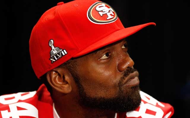 The ever mercurial Randy Moss is still undecided about his status. (Getty Images)
