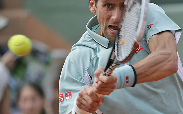 Djokovic keeps alive his pursuit of the only major he's yet to win. (Getty Images)