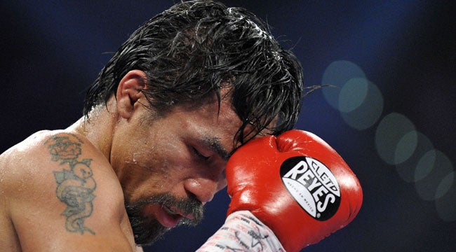 Manny Pacquiao lost in a heavily criticized split decision on Saturday night. (Getty Images)