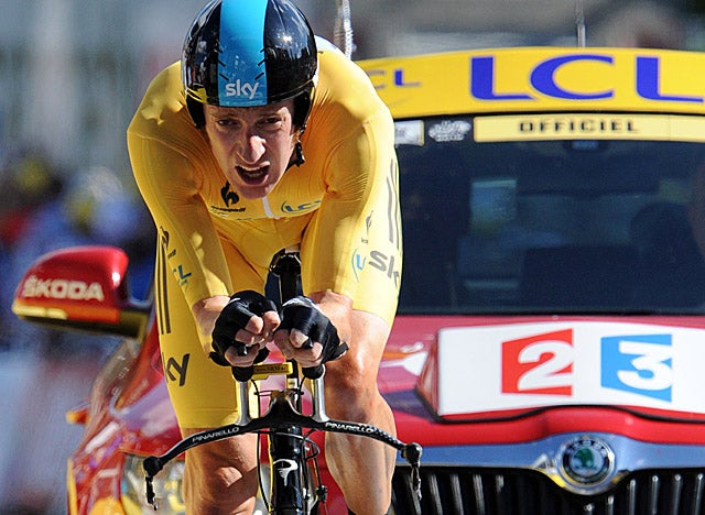 Tour leader Wiggins says winning the stage-nine time trial 'is like Christmas -- it's brilliant.' (Getty Images)