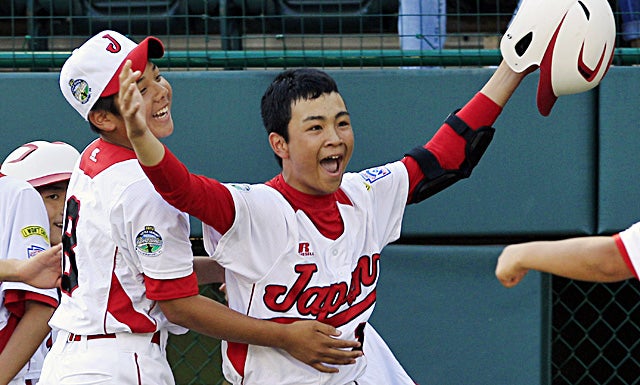 Noriatsu Osaka celebrates after hitting a  two-run home run against Tennessee in the fifth inning. (AP)