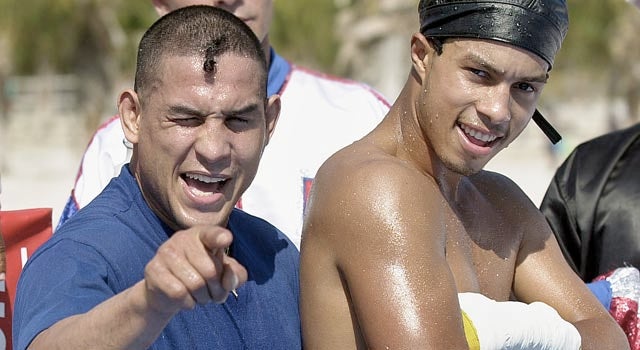 Hector Camacho Jr. (right) wants to keep his father (left) on life support. (Getty Images)