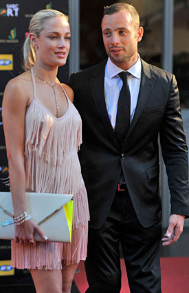 Reeva Steenkamp and Oscar Pistorius had been dating for a few months, according to the sprinter's former coach. (Getty Images)