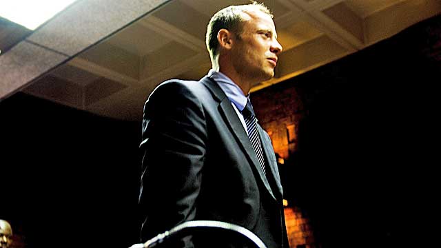 Pistorius stands in court for the charges during his hearing Friday. (Getty Images)