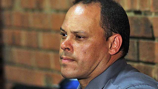 Hilton Botha, the initial investigating officer on the Pistorius case, faces charges of attempted murder. (AP)