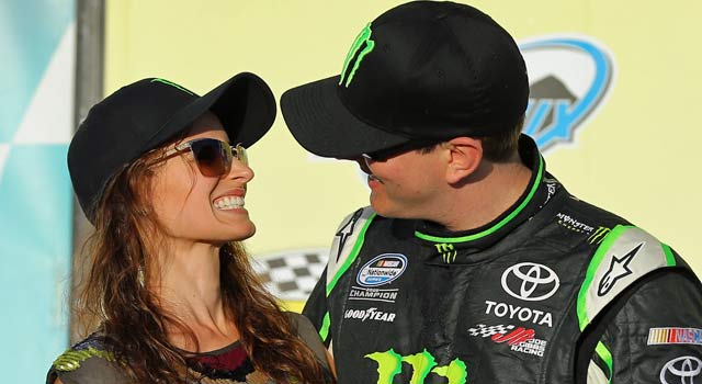 Kyle Busch celebrates with his wife, Samantha, after winning in Phoenix. (Getty Images)