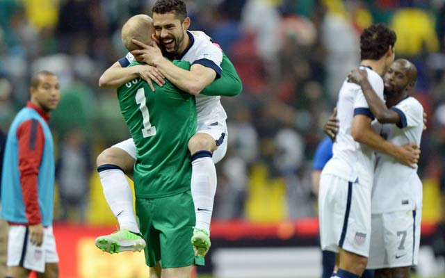Herculez Gomez and goalie Brad Guzan celebrate a rare American point at Azteca Stadium. (USATSI)