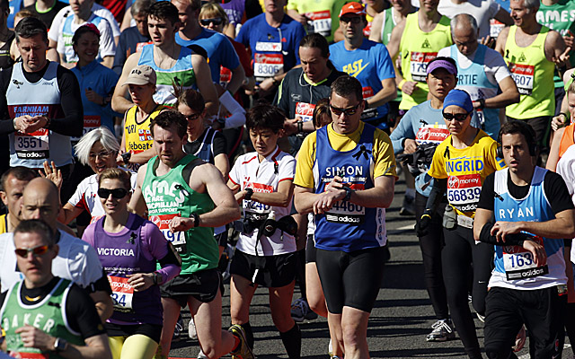 Runners in London wear black ribbons in memory of victims of the Boston Marathon bombings. (AP)