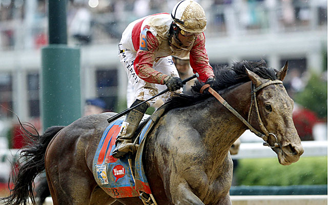 Orb, with Joel Rosario aboard, comes from off the pace to win the Kentucky Derby over Golden Soul. (USATSI)