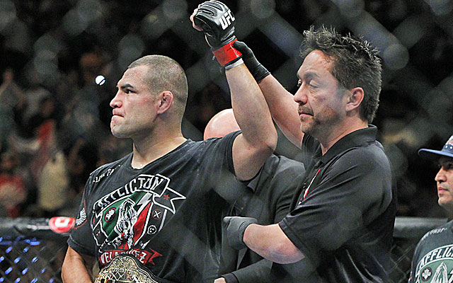 Cain Velasquez finishes off Antonio Silva in the first round to retain his heavyweight title. (USATSI)