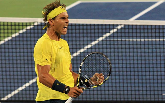 Rafael Nadal improves his record against Roger Federer to 21-10 and moves on to the semifinals. (USATSI)