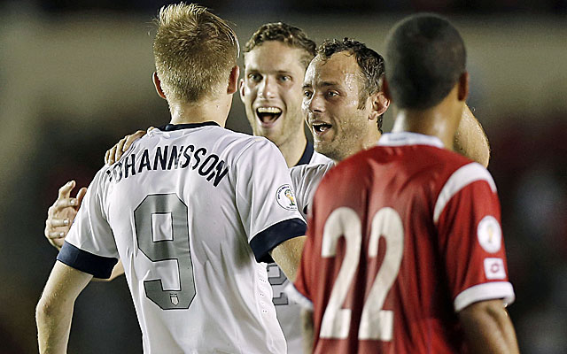 Aron Johannson celebrates with his US teammates after scoring his first international goal to beat Panama. (USATSI)